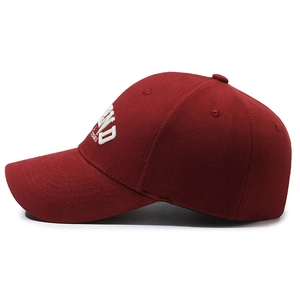 Classic burgundy baseball cap with white 3D letter embroidery in a soft cotton twill fabric
