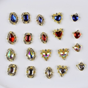 Variety of 20 gold alloy nail charms with colorful rhinestones in different shapes