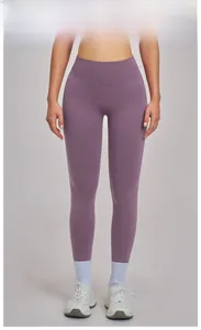 Detailed texture of seamless high-waist yoga pants in misty purple ribbed knit fabric
