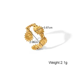 Macro shot of gold sunflower open ring detailing the 0.87cm width and floral texture