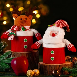Knitted Santa and Reindeer Christmas candy jars with plush texture on wooden base