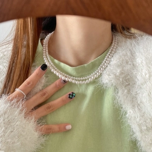 Double layer white pearl necklace for women in minimalist Korean style on model