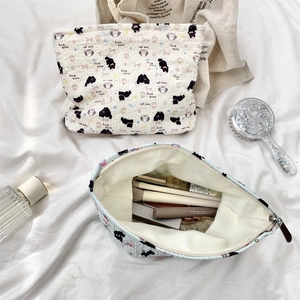 Quilted cotton makeup bag set with cat patterns showing interior storage and accessories