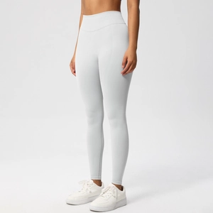 Close-up of light grey high-waist seamless yoga leggings with peach butt lifting effect