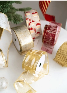 Detailed view of festive Christmas ribbons with snowflake and Santa Claus patterns