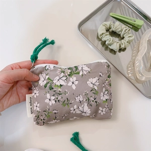 Floral cotton pouch with zipper and simple wish label for small items storage