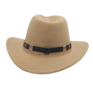 Detail of beige wool western cowboy hat with brown leather band and silver metal accents