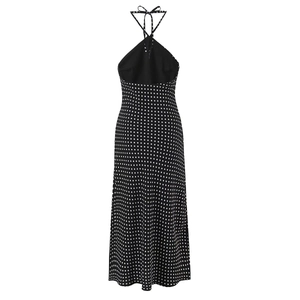 Back view of a black halter maxi dress with white polka dots and an open-back design
