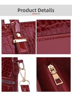 Detail view of burgundy crocodile pattern leather with golden hardware and zipper