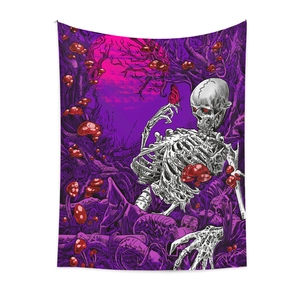 Detail of bohemian skull tapestry with red mushrooms in a surreal purple forest