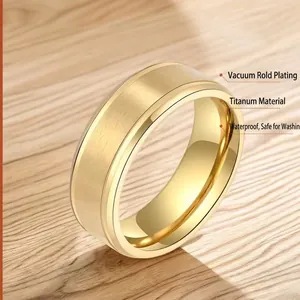 Polished gold titanium steel ring for men with a sophisticated brushed texture finish