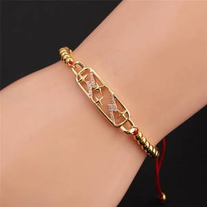 Bracciale stella in zirconi placcato oro con cordino rosso regolabile da donna