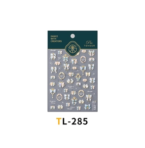 Détails de stickers nail art de Noël avec nœuds papillon et motifs de cadres dorés