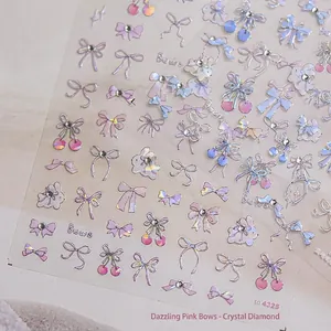 Glittering nail art stickers with pink bows, cherries, and rabbits for girls' manicure