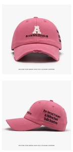 Detail of pink cotton baseball cap featuring 3D towel embroidery letter A and distressed brim