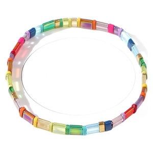 Handmade TILA bead woven bracelet with colorful rectangle enamel beads in a vibrant pattern