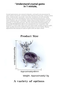 Detailed view of silver elk brooch with oval purple crystal inlay, 50mm height pendant