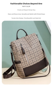 Detail view of large capacity vintage backpack featuring classic floral pattern and zip pocket