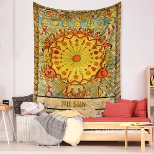 Detailed view of The Sun Tarot tapestry hanging as a bohemian bedroom wall backdrop