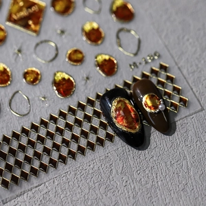 Amber-style nail art sticker set with gold metal accents and grid patterns M-186