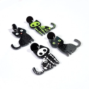 Halloween black cat acrylic earrings set with skeleton bone patterns and green eyes
