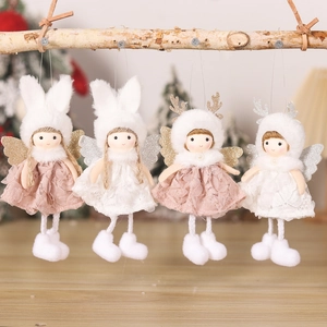 Detail of plush angel ornaments with bunny ears and antlers for Christmas tree decor