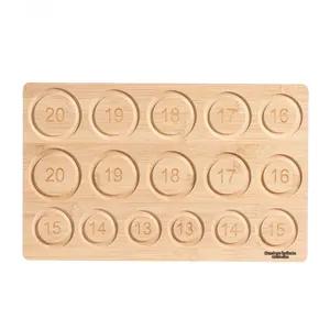 Close-up of bamboo jewelry sizing tray with engraved measurement numbers from 13 to 20
