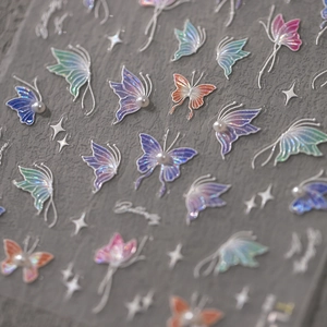 5D butterfly nail stickers with 3D embossed pearls and holographic laser gradient finish