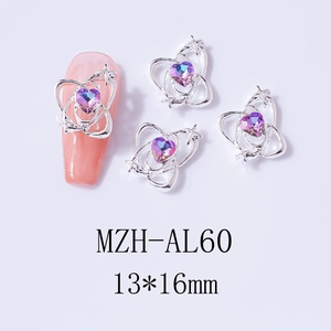 Detail of star-ring heart nail alloy charm with purple rhinestone and silver frame