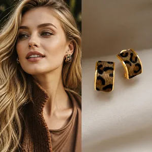 Detail of vintage square leopard print earrings with 925 silver needles and gold edges