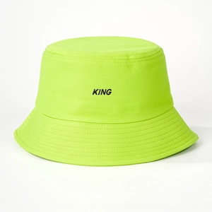 Detail of neon green cotton bucket hat with black KING embroidery and stitched brim