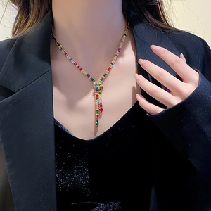 Luxurious gold-plated Y-necklace with multi-color cubic zirconia on female model