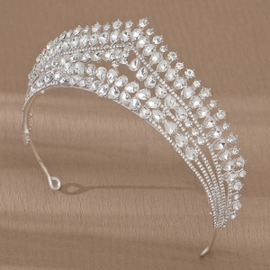 Detail of luxury bridal tiara with silver alloy and sparkling pear-cut rhinestones