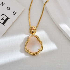 Detailed view of a gold-plated Maitreya Buddha pendant with opal and crystal accents