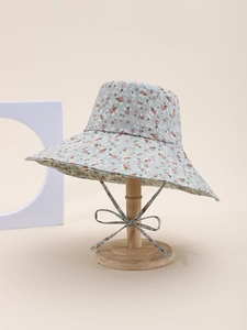 Floral wide brim sun hat detail with pink flowers and a matching windproof bow tie