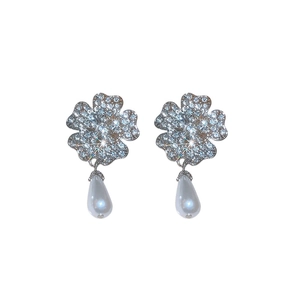 Silver four-leaf clover earrings with sparkling rhinestones and water drop pearls