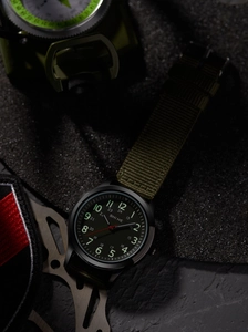 Tactical army green men's watch with nylon strap and 24-hour markers detail