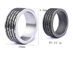 Detailed view of 10mm wide brushed silver and vintage grey textured steel rings