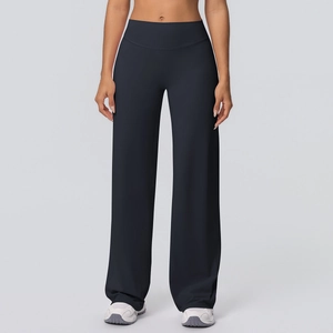 Close-up of high-waisted black yoga flare pants with soft fabric and wide leg fit
