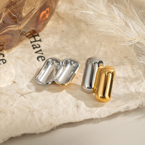 Modern two-tone geometric stud earrings in silver and gold plated stainless steel
