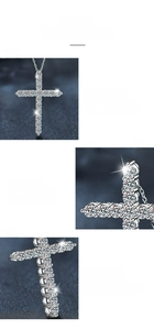 Detail view of moissanite cross necklace showing four-prong setting and 360-degree polish
