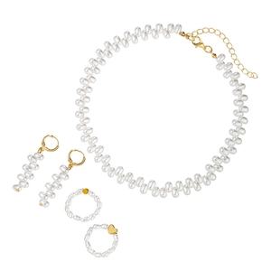 Detailed set of irregular pearl necklace earrings and gold charm rings on white background