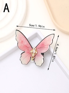 Detailed size view of a pink butterfly hair clip with rhinestones and measurements