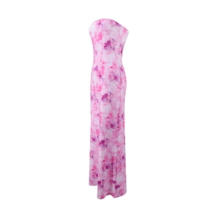 Close-up detail of pink floral print and soft fabric texture on the strapless maxi dress