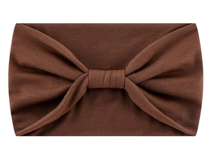 Close-up of brown knotted elastic sports headband fabric texture on white background