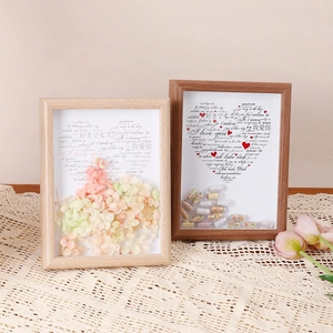 Creative DIY wooden shadow box frames with romantic floral and heart designs for couples