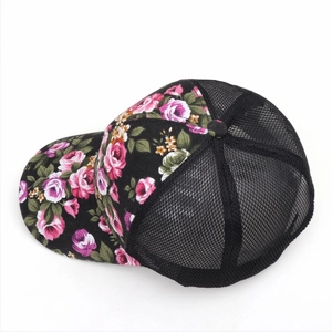 Detail view of floral print baseball cap with breathable mesh back and cotton brim