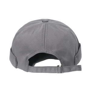 Detailed back view of grey cotton docker cap with adjustable fabric strap and metal buckle