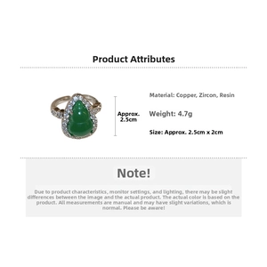 Detailed size chart of a green resin gourd ring with cubic zirconia and copper band