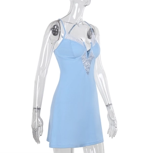 Detailed view of the delicate white lace trim on the light blue V-neck mini dress
